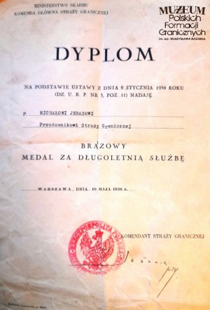 dyplom otrzymania przez przod. Michała Jebasa Brązowego Medalu za Długoletnią Służbę
